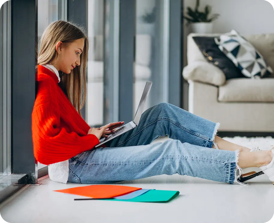 girl-student-studying-computer-by-window